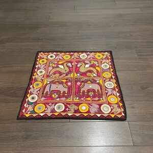 Hand embroidered wall panel from India